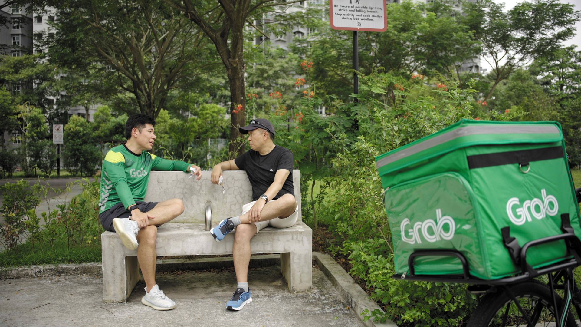 A conversation on a bench between Anthony Tan and Jixun Foo